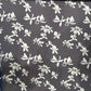 Cotton-Linen Printed Fabric – Charcoal Grey with White Floral Motifs (45% Cotton, 55% Linen)